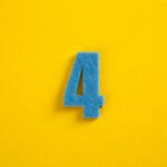 colorful number on yellow background