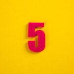 colorful number on yellow background