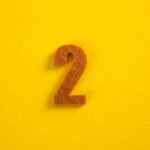 colorful number on yellow background