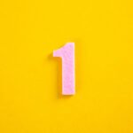 colorful number on yellow background
